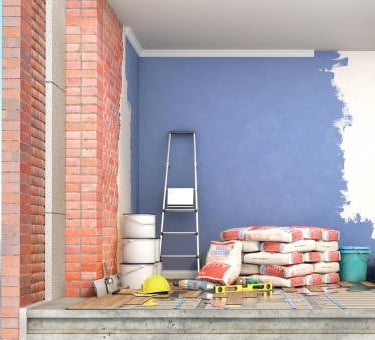 a room with a ladder and a ladder