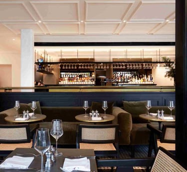 a restaurant with a bar and a bar with a bar