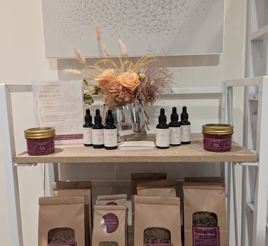 a display of an assortment of products from Moonstone & Mulberry Herbal Remedies
