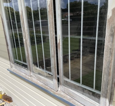 Weathered window frame before exterior repainting by PJCPainters