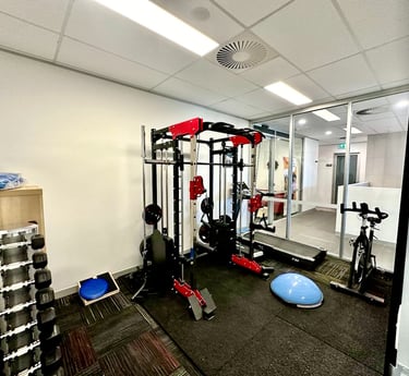 a gym room with a gym equipment and a gym equipment