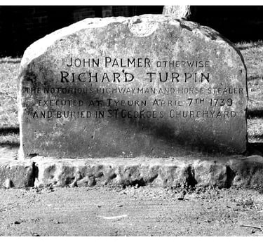 Black and white photo of Dick Turpin's gravestone in St George's churchyard, York.