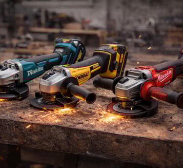 Cordless angle grinders from Makita, DeWalt, and Milwaukee on a metal workshop bench with sparks.