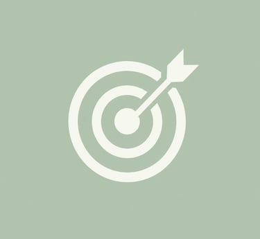 A white target icon with an arrow hitting the bullseye on a sage green background.