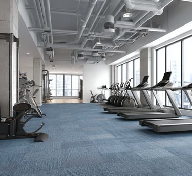 Commercial carpet installation for a apartment gym in Katy