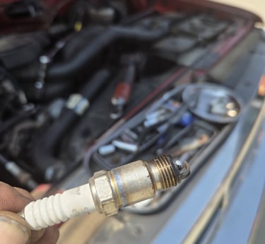 Spark plug that was removed from a 1992 Ford F150 by Fast T's Auto Technician in Waukee Iowa 50263