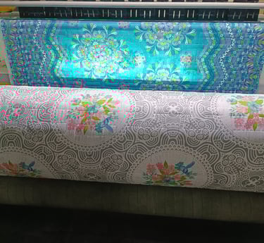 a machine is making a large print on a large machine