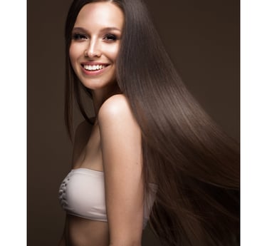 A white lady with long brown hair