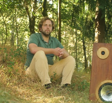 Guus Fölkel from Fölkel Audio with Constellation hi-fi speaker set in forest