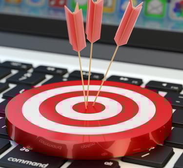 a red target target with three arrows in the center of a target