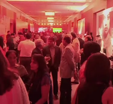 a group of people standing in a hallway