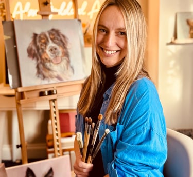Alex painting in her home studio in West Su