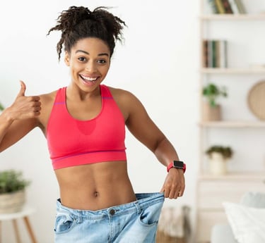 a woman in a pink sports bra top and jeans