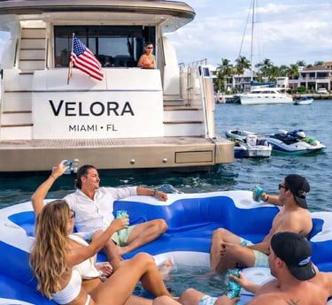 Luxury yacht party in Miami with private charter experience and group enjoying on the water
