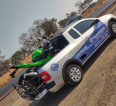 a motorcycle parked on the side of a road