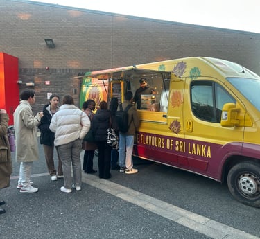 Sri-Licious food van with a queue
