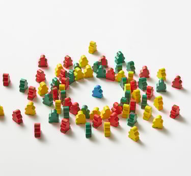 A group of wood pawns gathered around one of them, reflecting leadership and influence