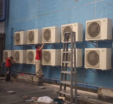 Suasana Aircond installation services Selangor commercial HVAC Daikin unit repair.