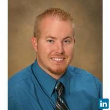 a man in a blue shirt and tie dye dye dye dye dye dye dye dye