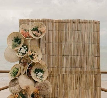 a wooden fence with a bunch of flowers on it