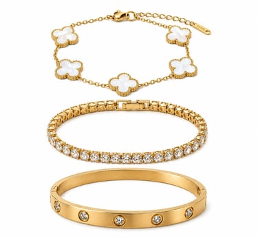 Elegant layered gold bracelet set.