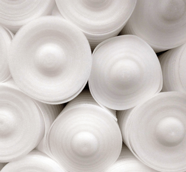 a bunch of white foam rolls