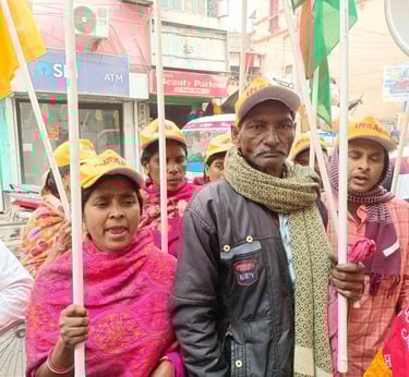 INSAF party worker engaging in grassroots social and political work, connecting with local people to