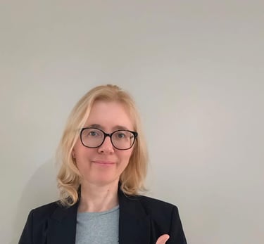 Professional psychologist smiling for a photo in formal wear