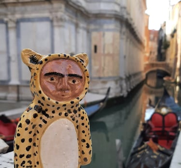 handmade ceramic leopard ceramic figurine visiting venice