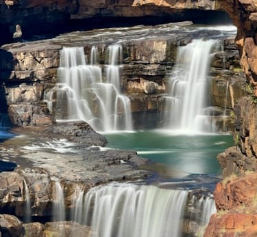 scenic view of a waterfall with three tiers