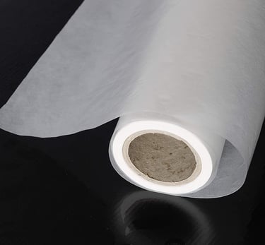 a roll of white paper with a roll of tissue paper