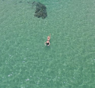 Floating over Paunch Beach