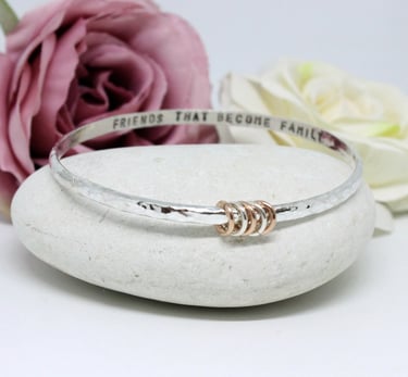 Personalised Silver Bangle with a hidden message and a silver and gold ring to represent a loved one