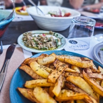 a plate of food and a bowl of salad