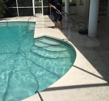 Cleaning pool deck area by pressure washing services pressure washer