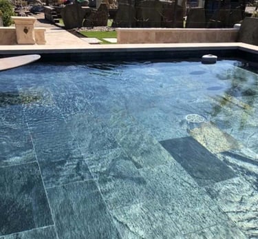 Slate tiles used in the swimming pool - Manrise Enterprises