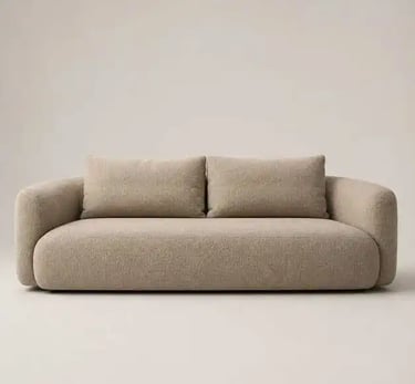 Contemporary low-profile beige bouclé sofa with clean lines and a sculptural silhouette, adding warm