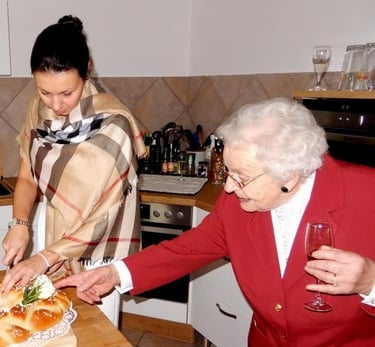 young woman and grandma in kitchen, dressed up - copyright Tanja Dietzig