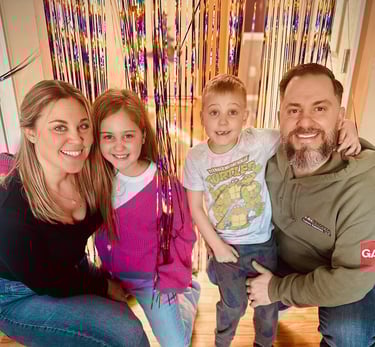 Tom Trotta with his wife and children, sharing their journey with ADHD and learning differences