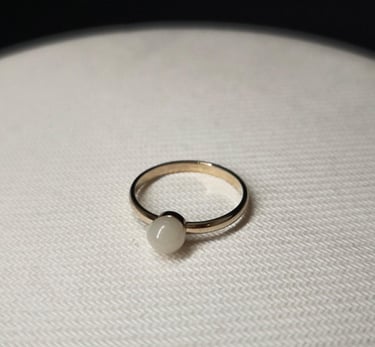 anillo oro blanco con leche materna