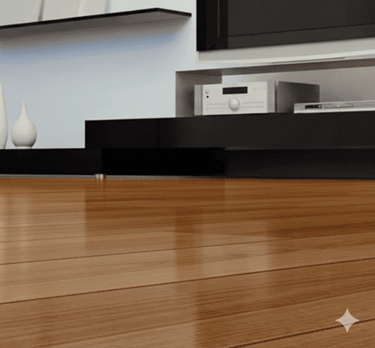 Polished high-gloss hardwood flooring in a modern living room with minimalist furniture.