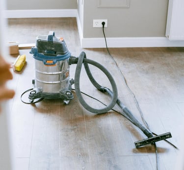 Professional post-construction cleaning service for dust and debris removal in a new home