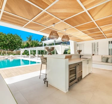 Villa Serenity pool bar with modern white canopy roof