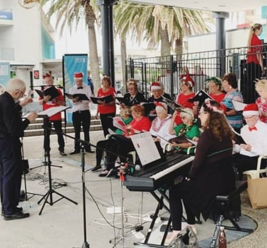 The District Singers perform at Cronulla Mall
