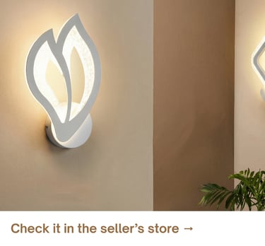 Modern wall sconces with soft ambient lighting adding warmth and a contemporary accent to a neutral