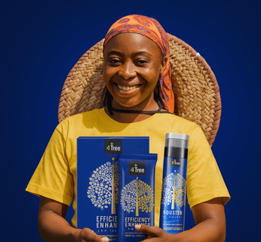 Agricultrice africaine utilisant des engrais naturels 4Tree pour des cultures durables