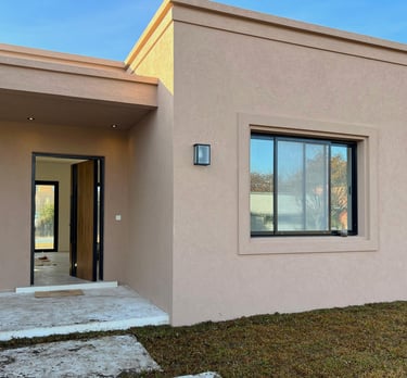 a house with a large window and a door