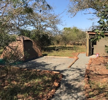 Glamping dome tent site with private bathroom at Albizia Tented Camp in Hluhluwe