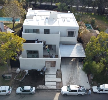a house with a white truck parked in front of it