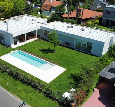 a house with a pool and a swimming pool